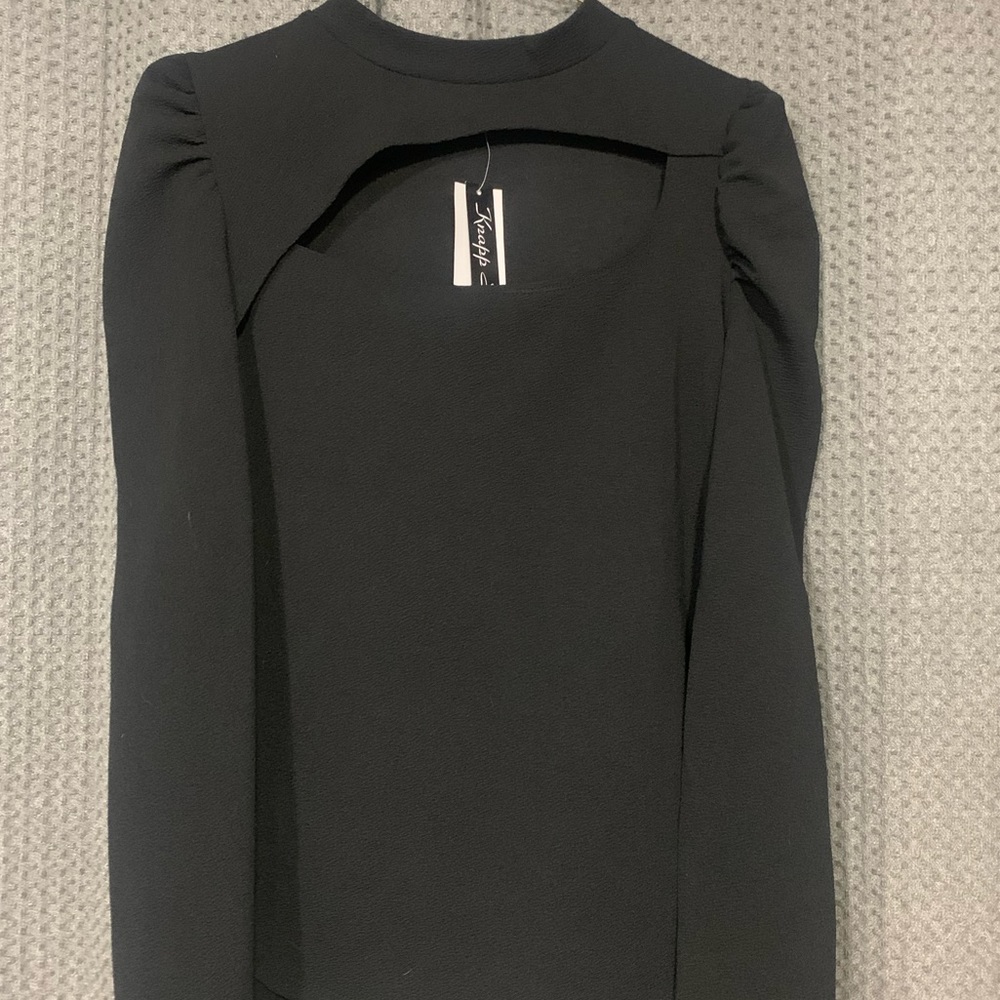 NEW long sleeve, puff shoulders and exposed chest blouse. Super cute!